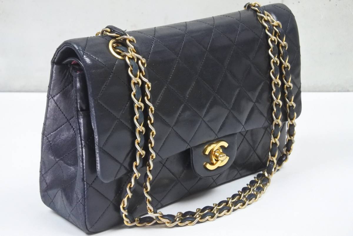CHANEL Black Lambskin 25 Double Flap Handbag