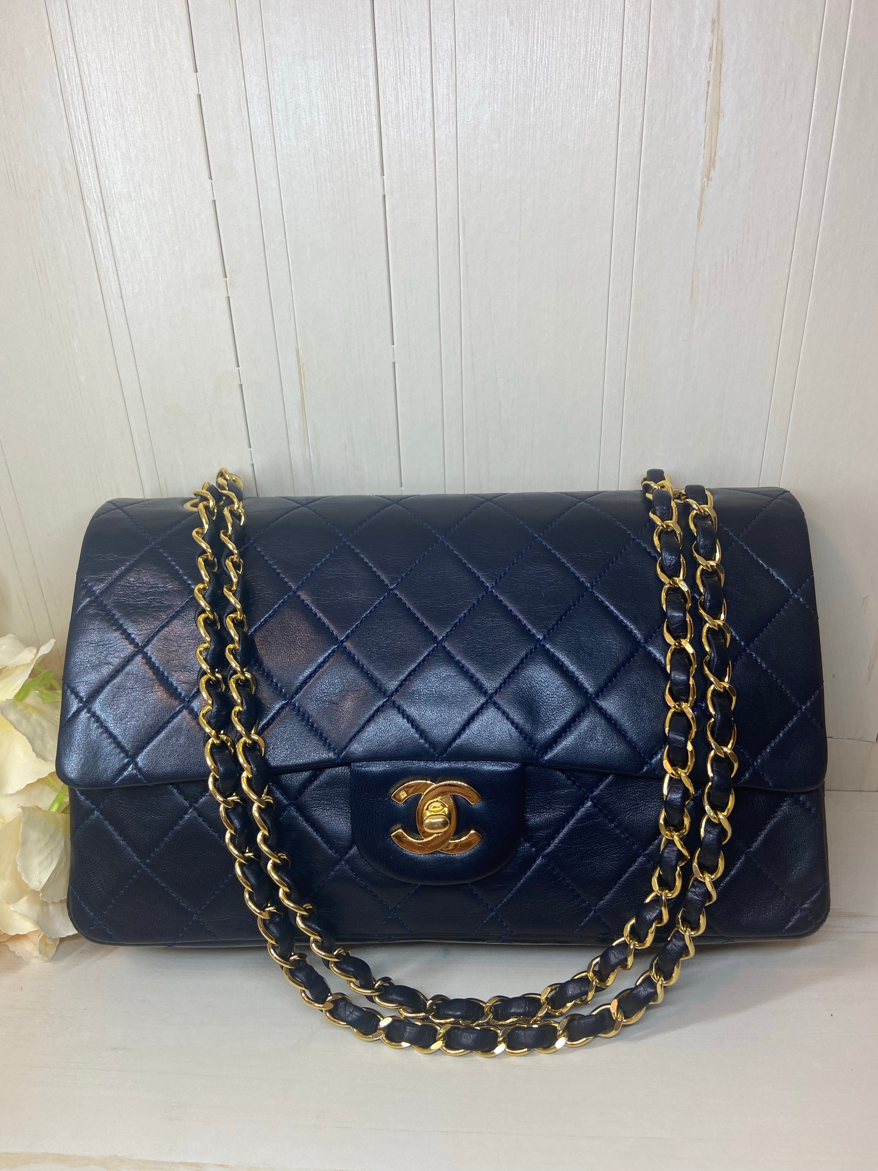 CHANEL Double Flap Quilted Lambskin Leather Gold Hardware Bag