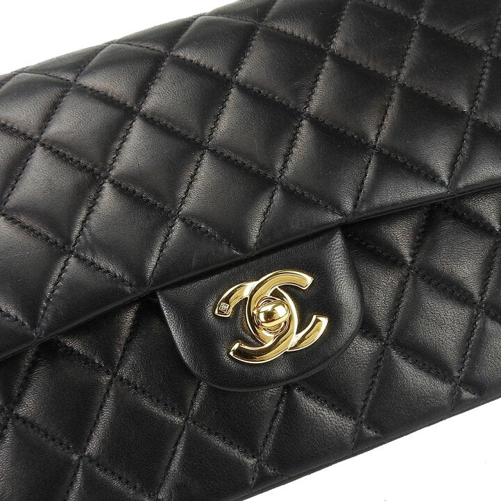 Vintage CHANEL Black Lambskin Gold Hardware Medium Double Flap Bag
