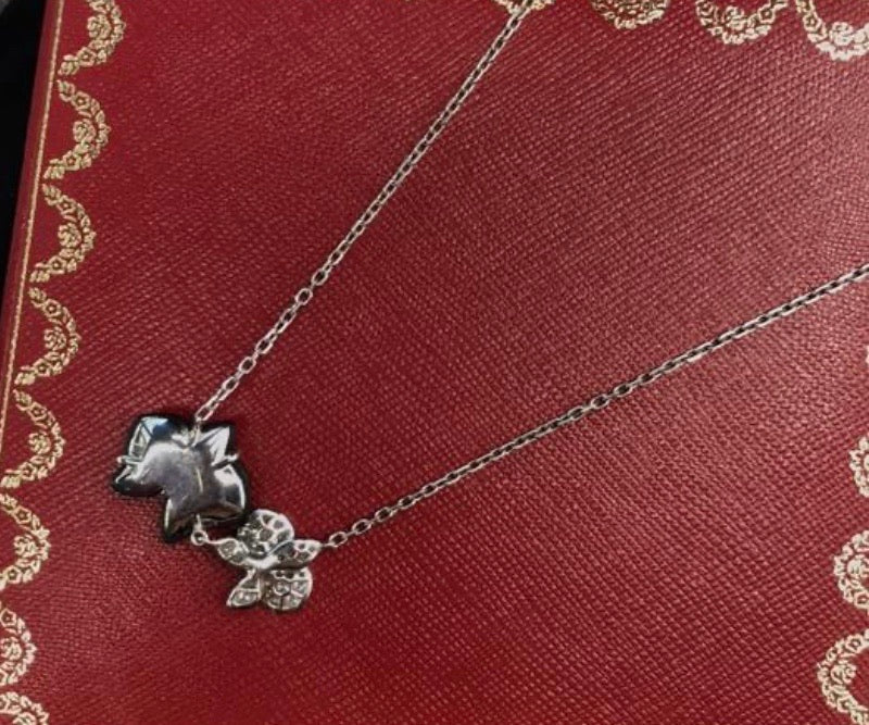 Cartier Caresse D’Orchidees Diamond & Black Onyx Flower Necklace / Pendant